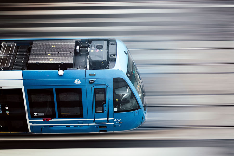 Photo of a blue and white mass transit train, Stockholm, Sweden